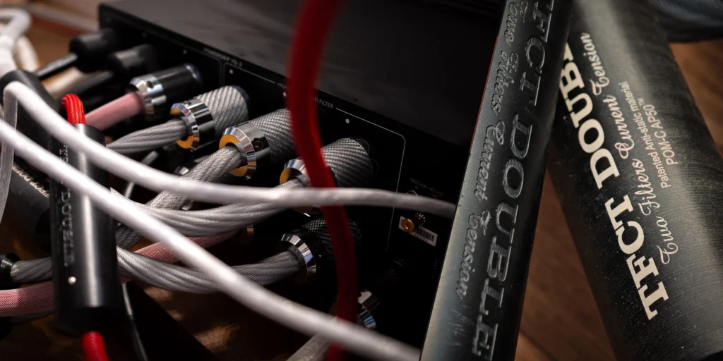 Mains power connections and cable modules beside a power strip.